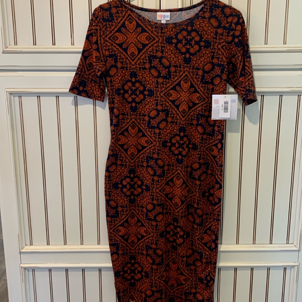LuLaRoe Julia small . Polyester spandex tons of stretch brand new with tags.